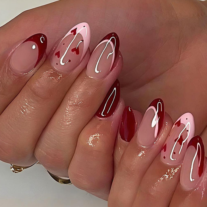 Acrylic nail set with romantic heart designs and elegant shine Kalsten