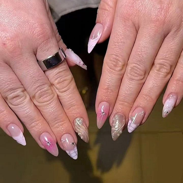 Artful Nail Extensions with Glitter and Shell Motifs Kalsten
