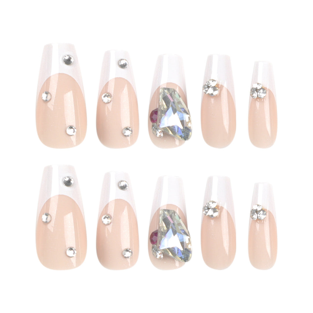 Artistic nail art with glitter accents and rhinestone embellishments Kalsten