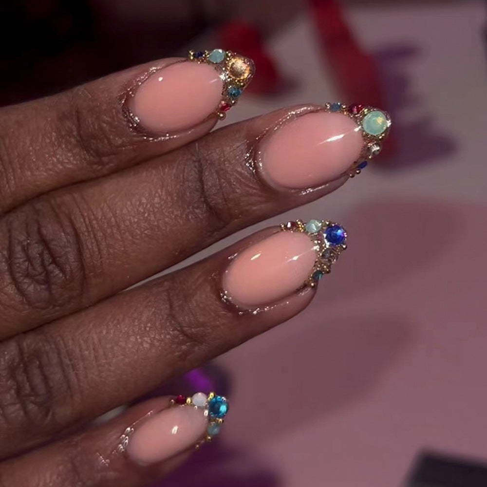 Artful nail art with glamorous rhinestone embellishments Kalsten