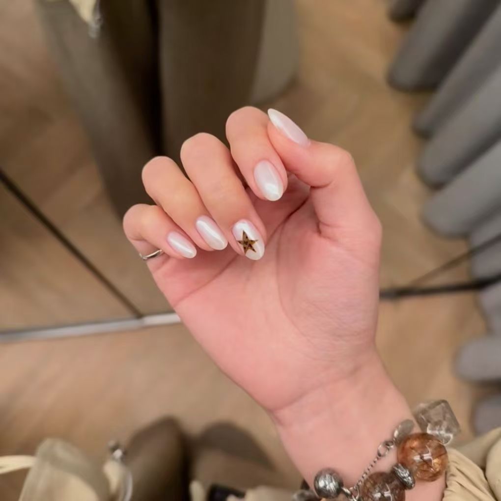 Elegant Nail Art Extensions with Star Accents