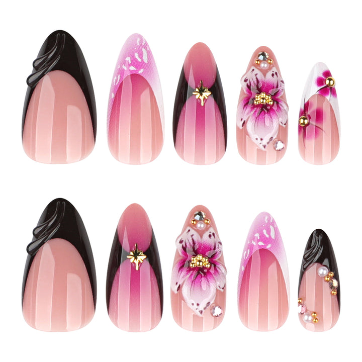 Artful stiletto nails with blooming design and glitter accents Kalsten