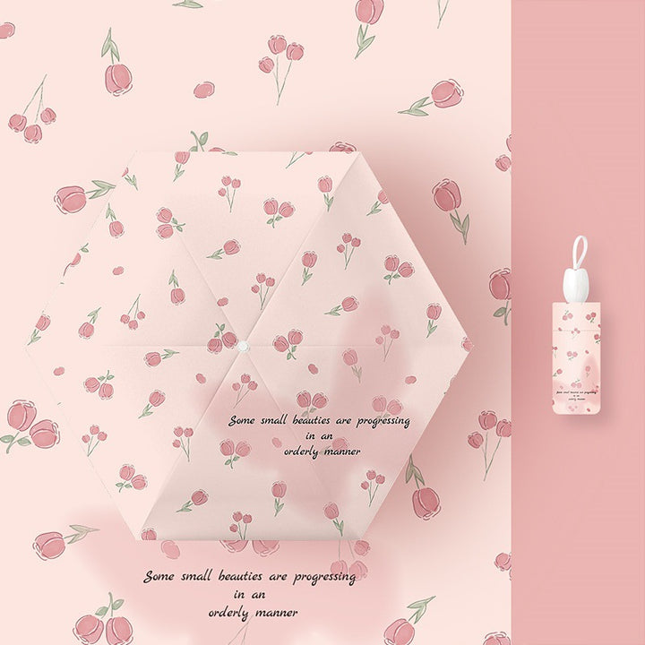Ladies folding umbrella with playful flower design Kalsten