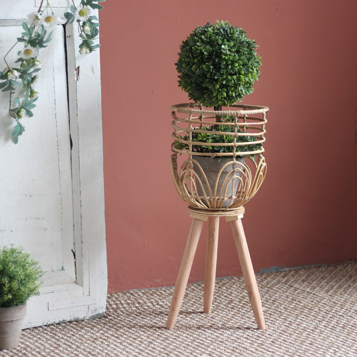 Stylish plant stand made of rattan and wood Kalsten