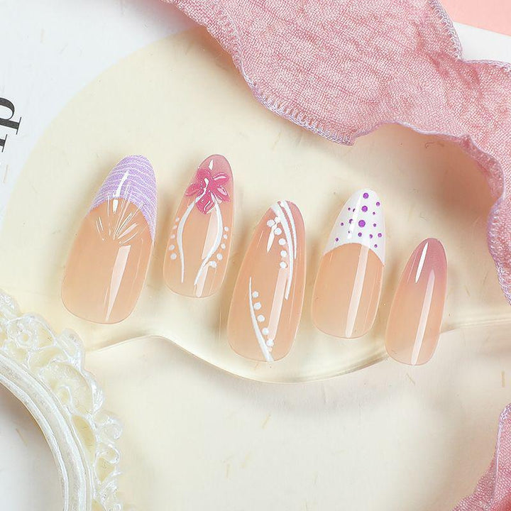 Acrylic nail set with glamorous golden accents Kalsten