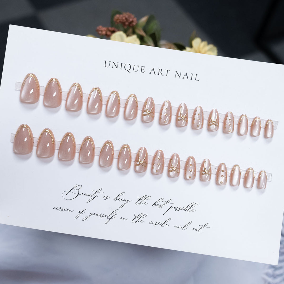 Artistic Press-On Nails with Gold Accents