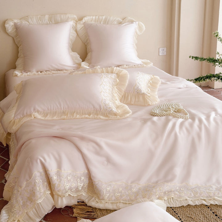 Luxurious satin bedding set with lace and ruffle decoration