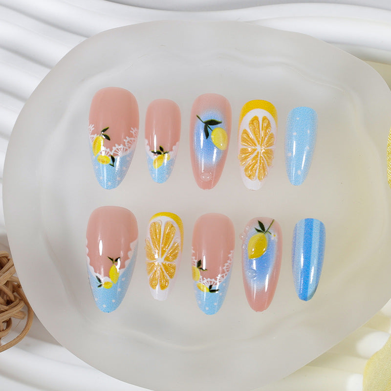 Artificial nail set with cheerful citrus and flower motifs Kalsten
