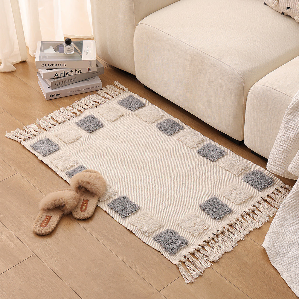 handwoven cotton runner with fringe and embossed relief pattern