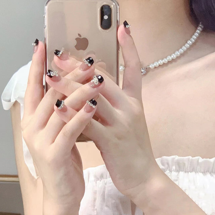 Glamorous nail art with rhinestone embellishments Kalsten