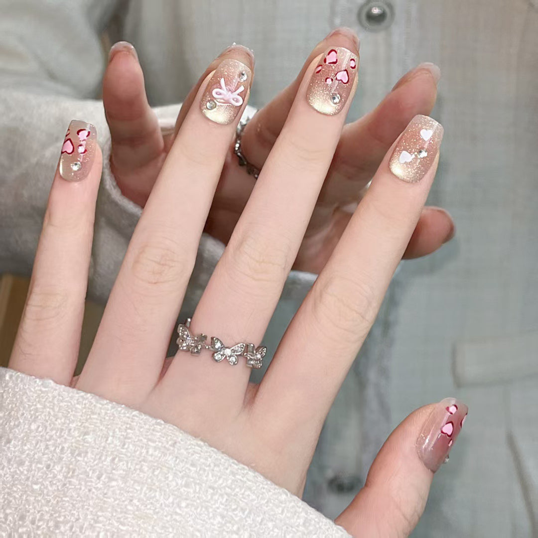 Artistic Press-On Nail Set with Heart and Bow Designs Kalsten