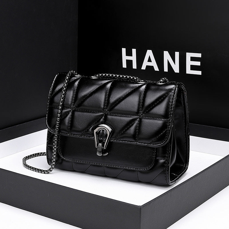 Elegant Quilted Chain-Trimmed Handbag