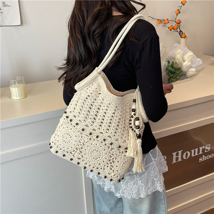 Hand-knotted shoulder bag with playful fringe design Kalsten