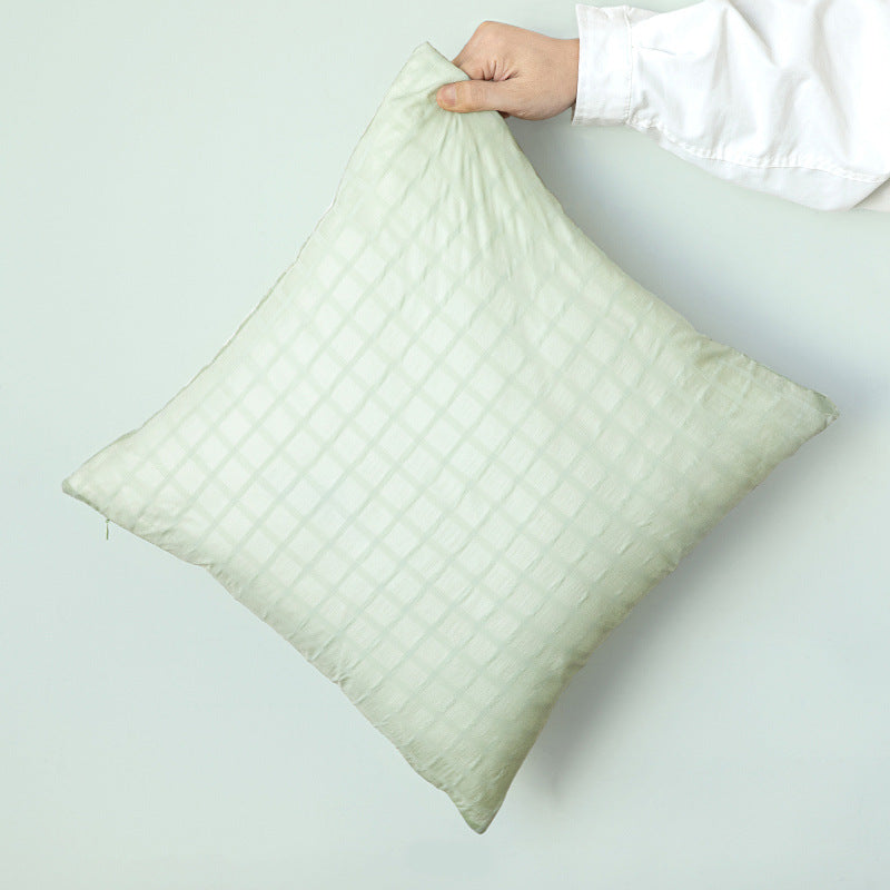 Square decorative cushion with delicate mother-of-pearl look and fine micro tuft structure