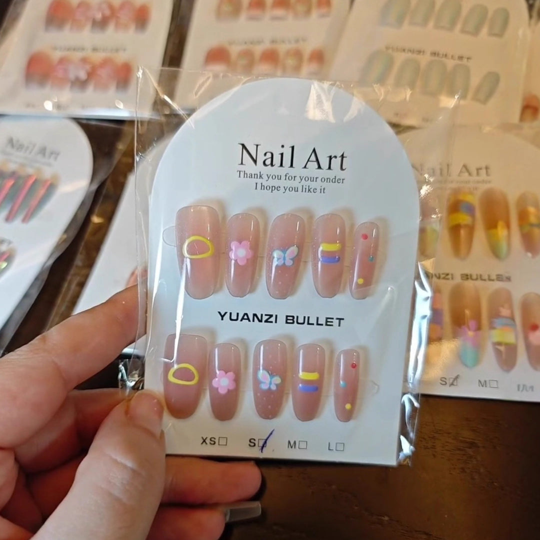 Decorative Press-On Nail Art Set with Floral and Patterned Designs