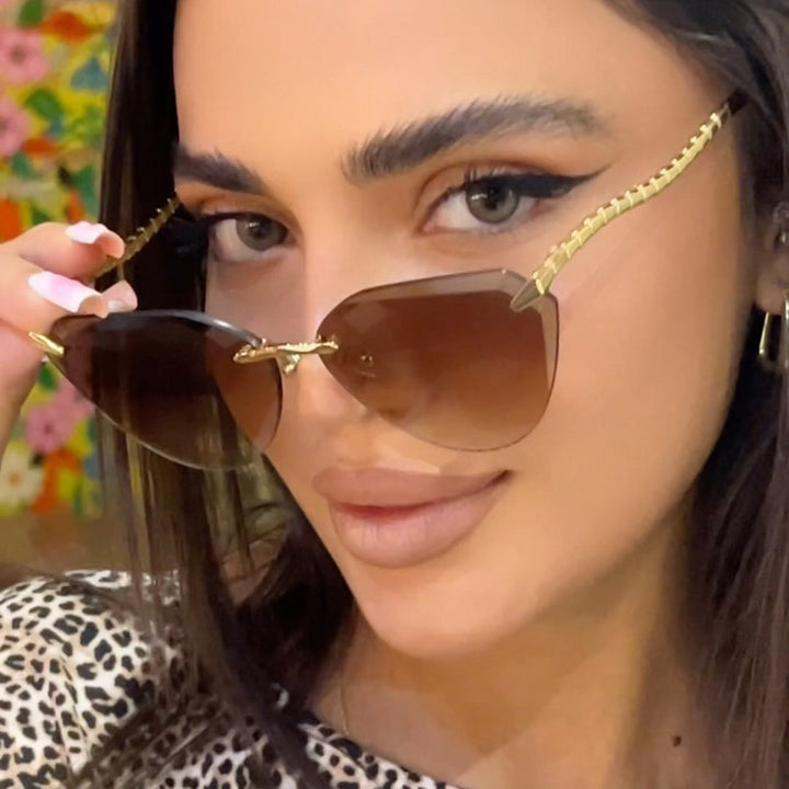 Women's Cat-Eye Sunglasses with unique gold frame design and protective lenses Kalsten