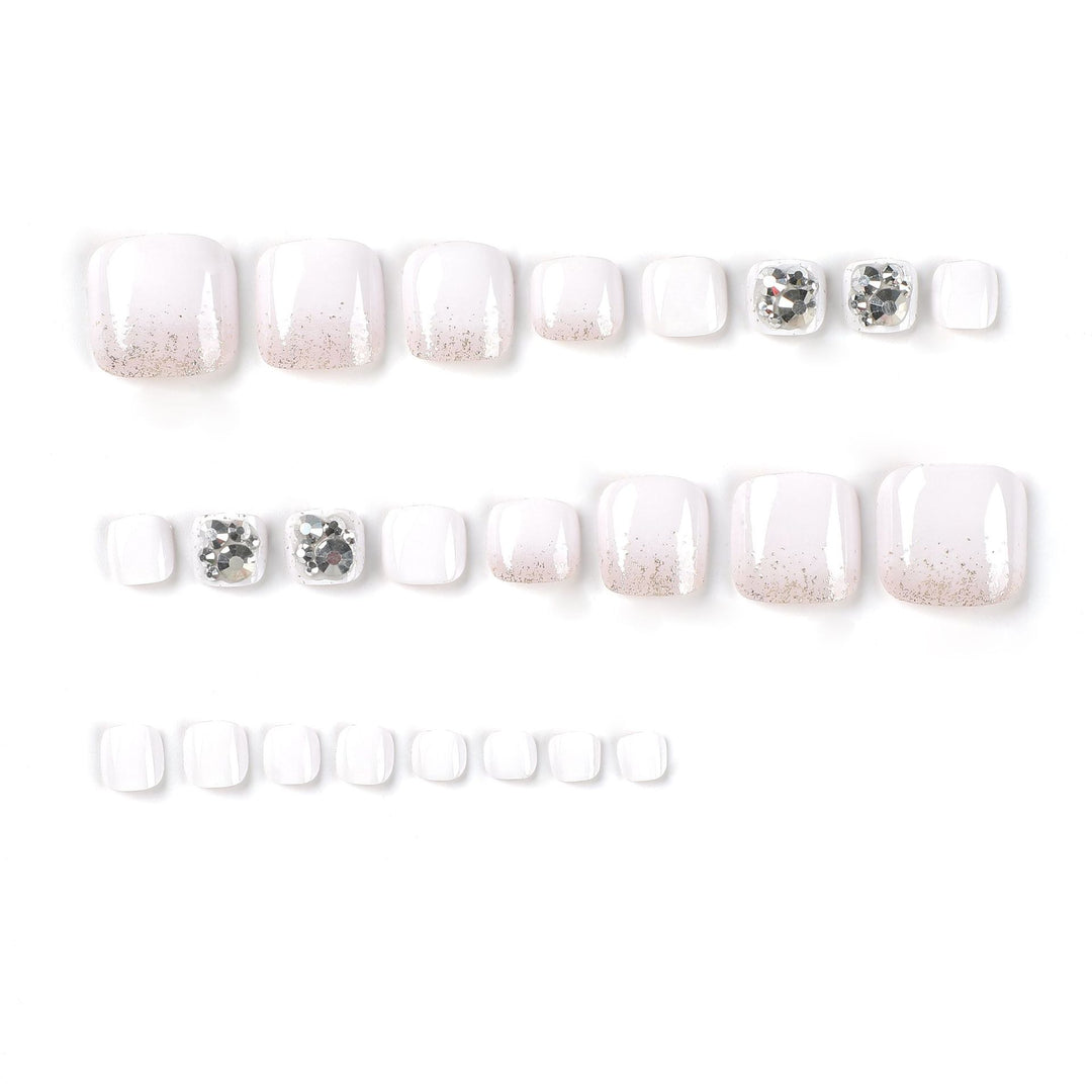 Artful toenail design with sparkling embellishments Kalsten
