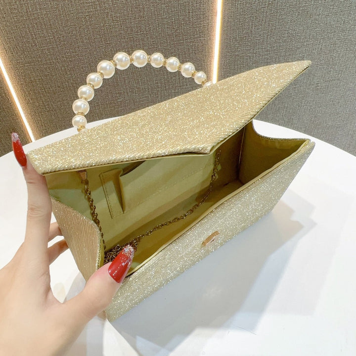 Elegant Pearl-Handled Evening Clutch