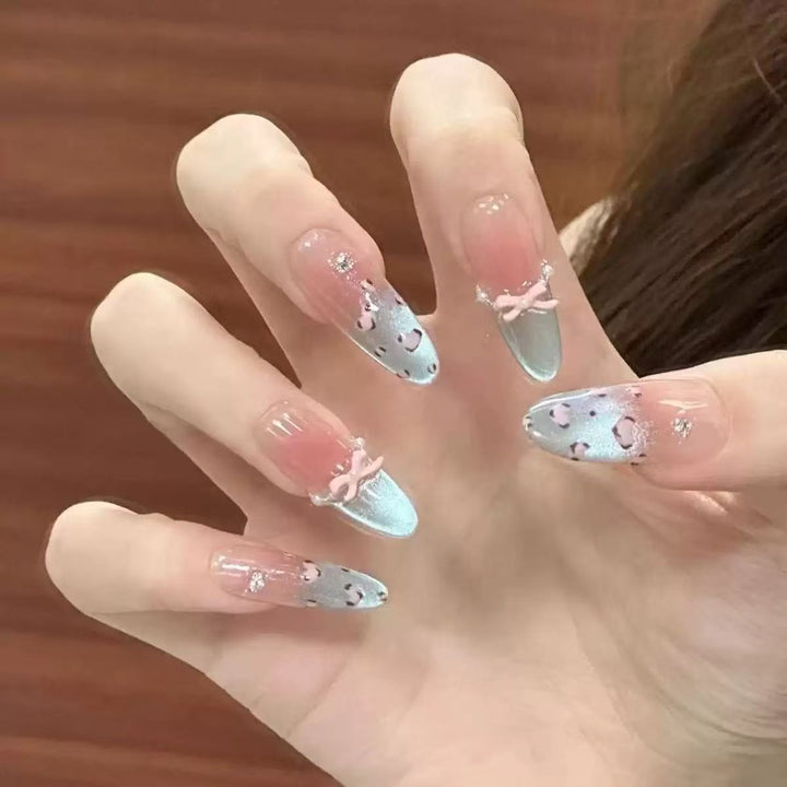 Decorative Press-On Nail Extensions with Bow and Rhinestone Accents Kalsten