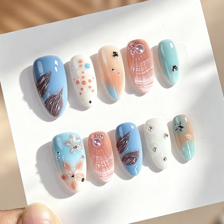 Creative nail art set with delicate floral and maritime designs Kalsten