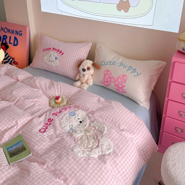 Children's bedding set with quilted plush dog appliqué and vichy check