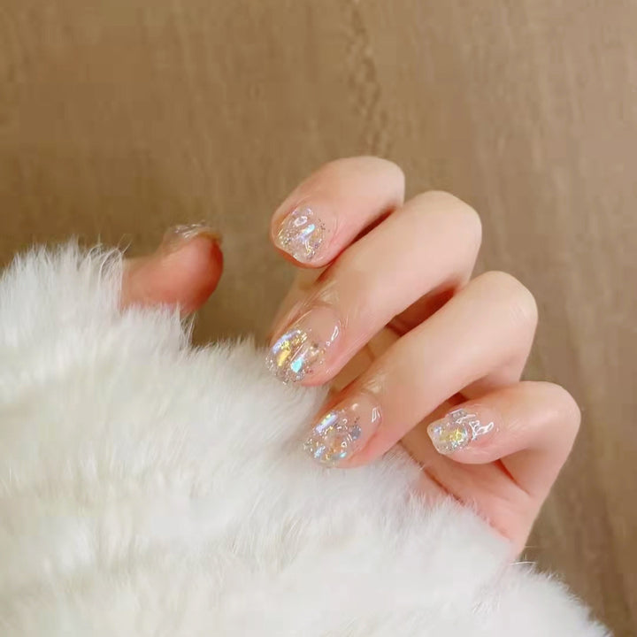 Glittering artificial nails with holographic accents Kalsten