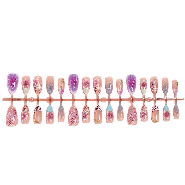 Artificial nail set with floral designs and glamorous accents Kalsten