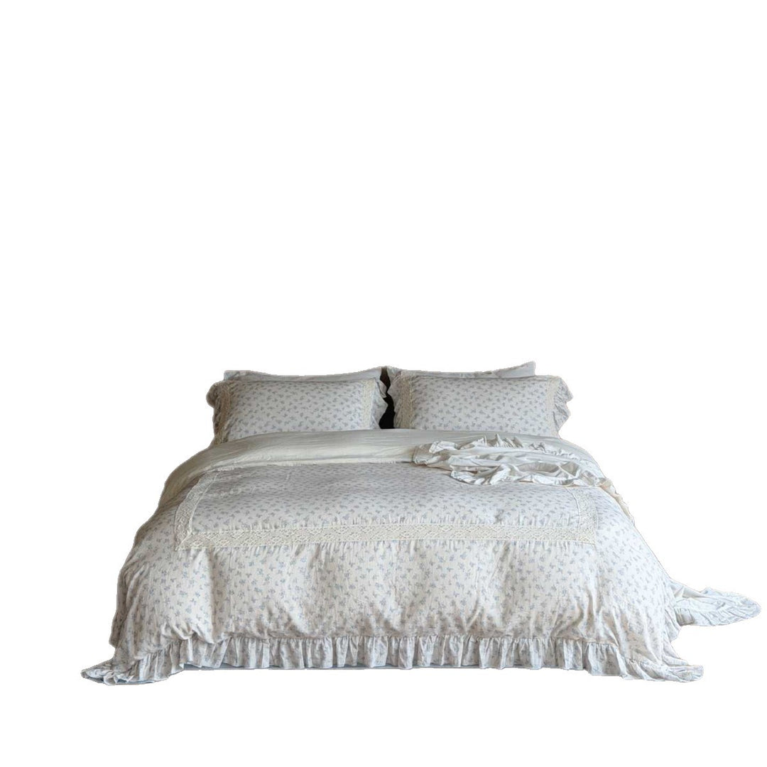 Vintage-inspired bedding set with lace appliqué and ruffle