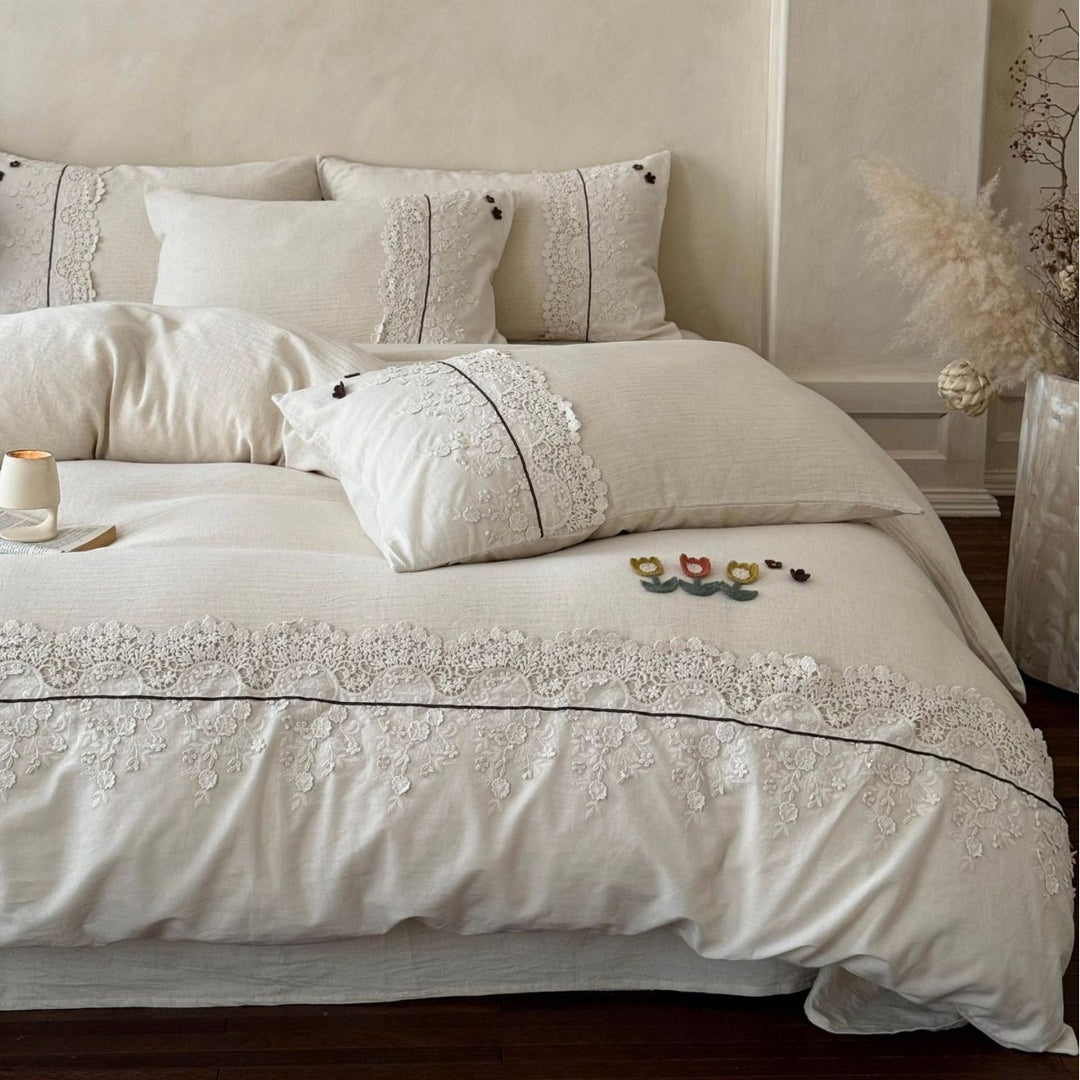 Bedding set in linen look with embroidered lace border and fine embroidery