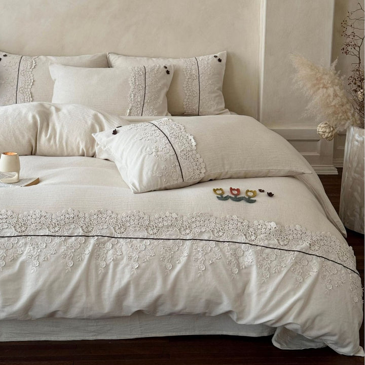 Bedding set in linen look with embroidered lace border and fine embroidery