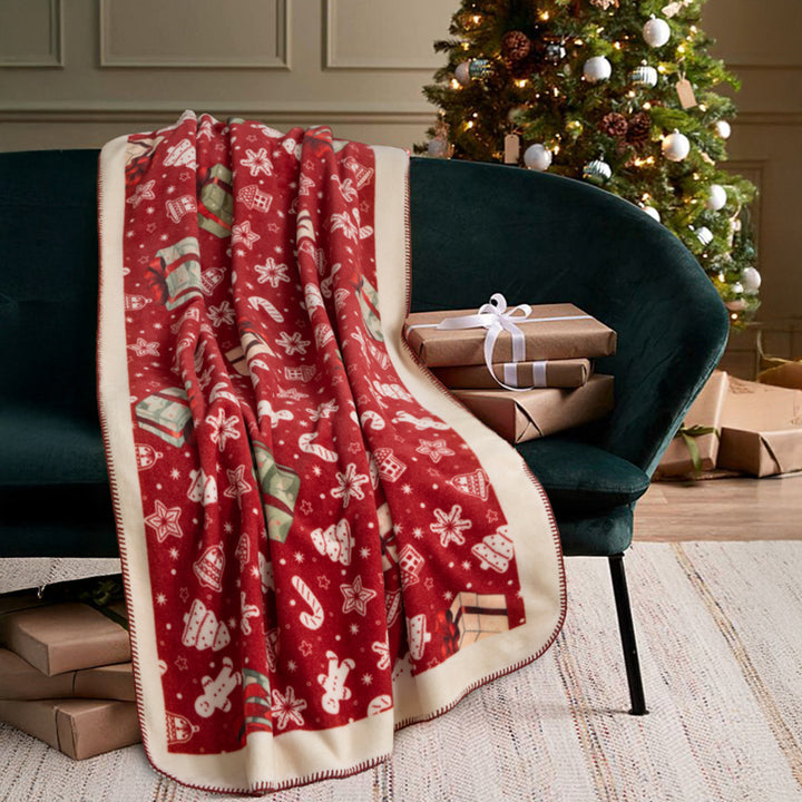 Christmas cuddle blanket with gift and gingerbread pattern