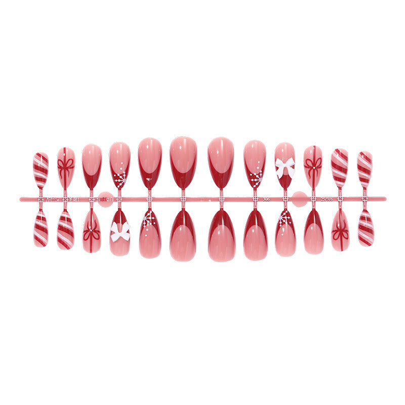 Art nail set with festive design, charming decorations, and glitter accents Kalsten