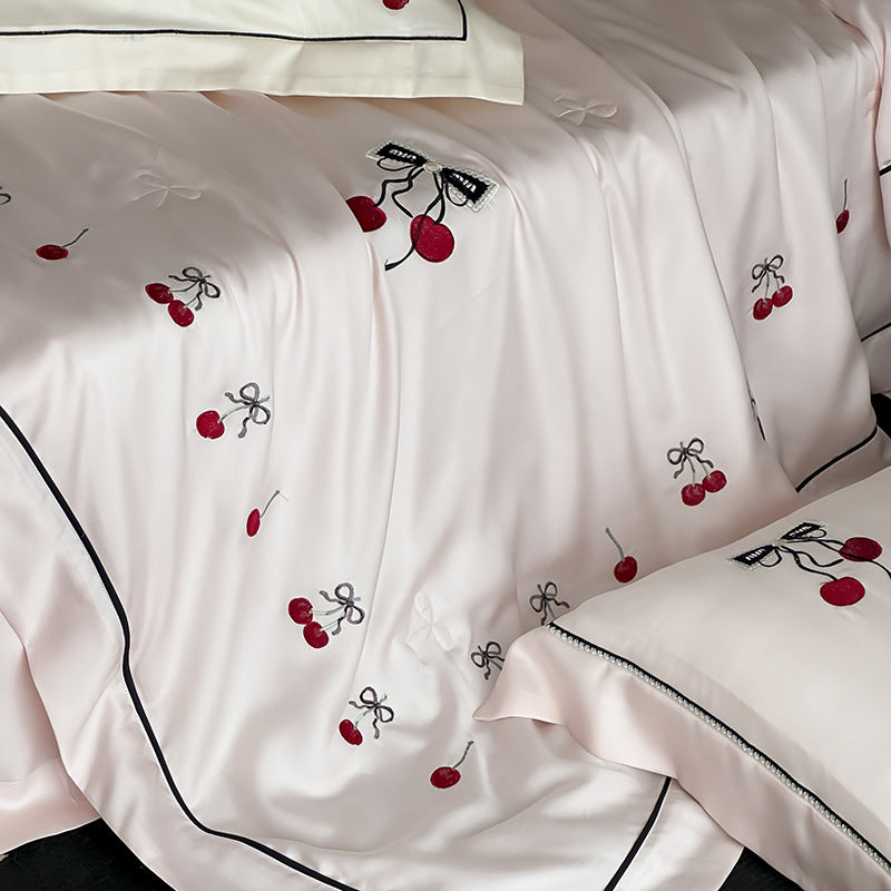 Cotton satin bedding set with cherry embroidery and contrasting piping
