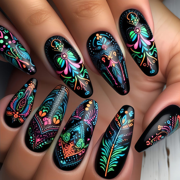 Art nails with delicate floral design and vibrant color plays Kalsten