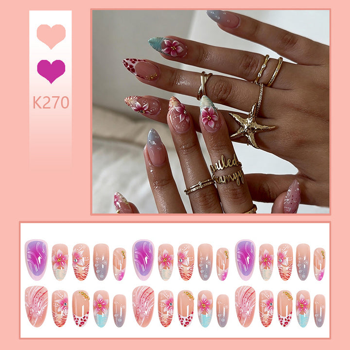 Artificial nail set with floral designs and glamorous accents Kalsten