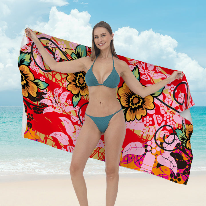 Beach towel with vibrant tropical plant motif Kalsten