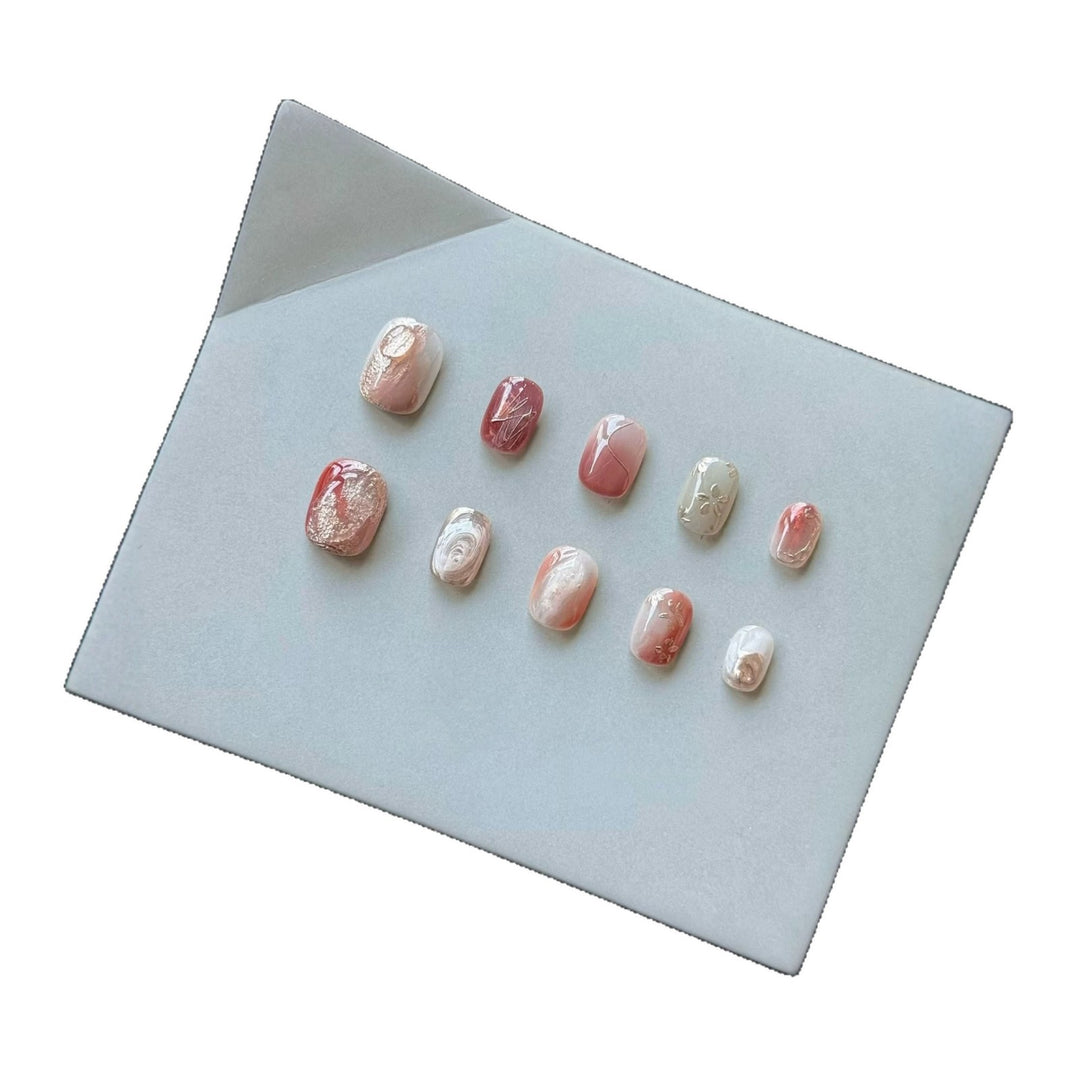 Artistic Press-On Nail Set with Marble and Metallic Accents