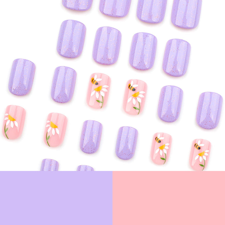 Artfully designed nail extensions with flower design Kalsten