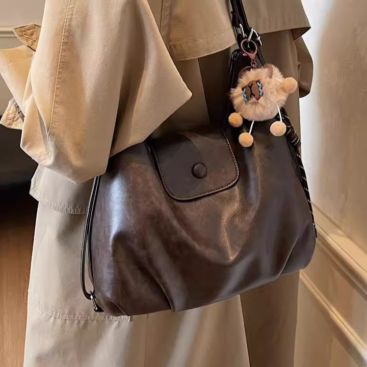 Modern shoulder bag with practical flap closure Kalsten