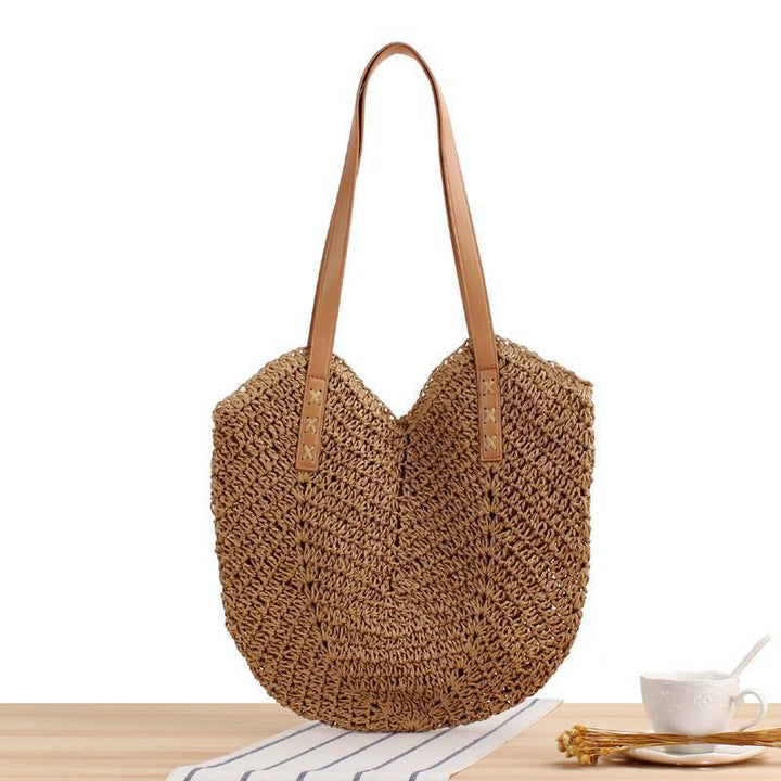 Generous straw shoulder bag with leather handles Kalsten
