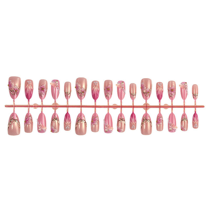 Nail art set with floral 3D designs and elegant shine accents Kalsten