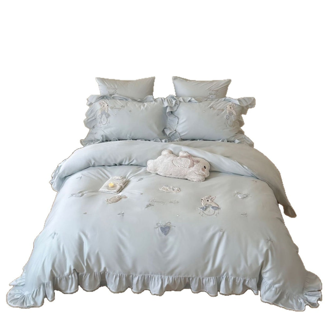 Satin bedding set with ruffles, embroidered bunny appliqués and silky-smooth finish
