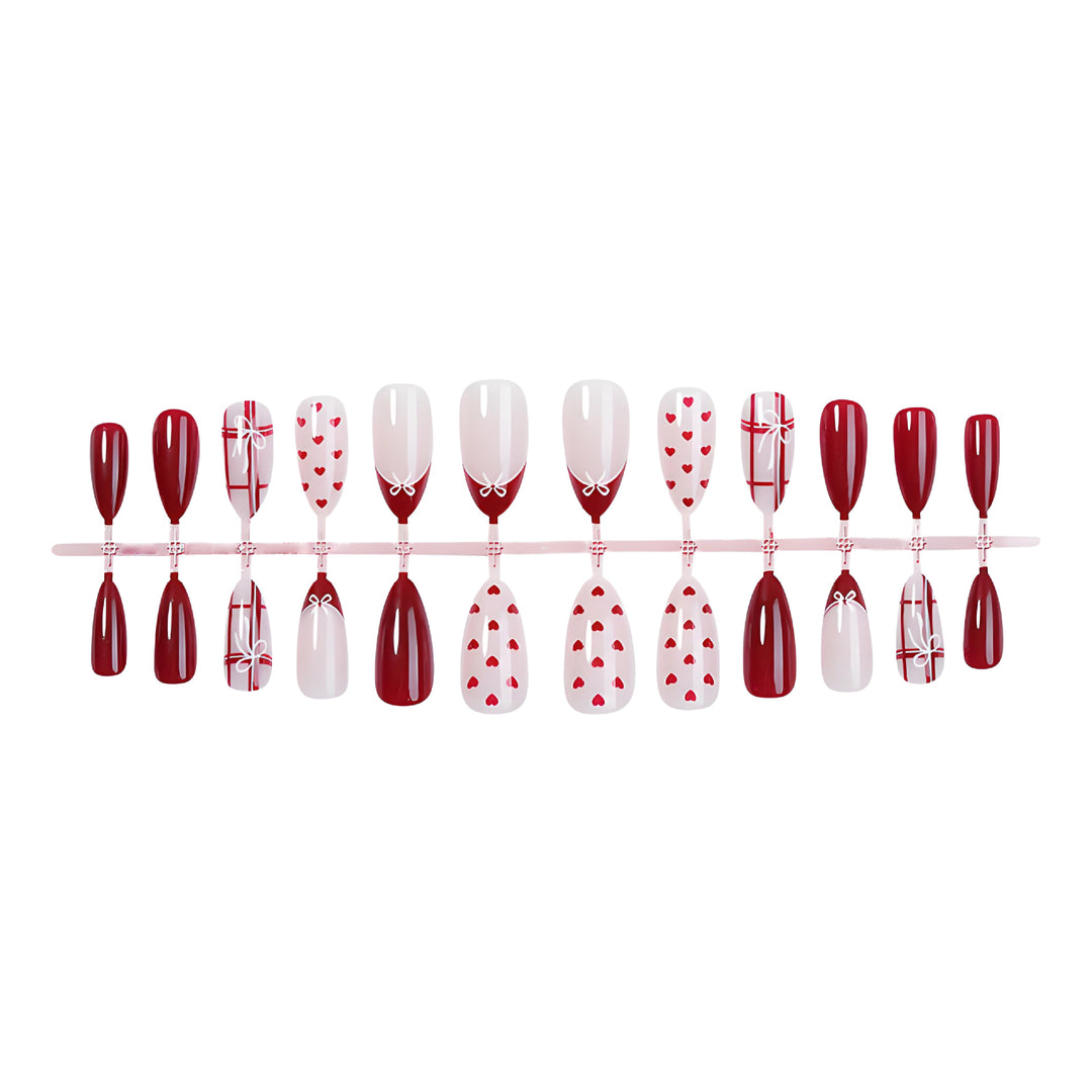 Nail set with playful hearts and elegant bows Kalsten