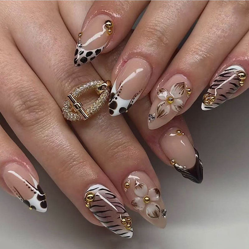 Artistic Nail Art Set with Floral and Animal Print Design