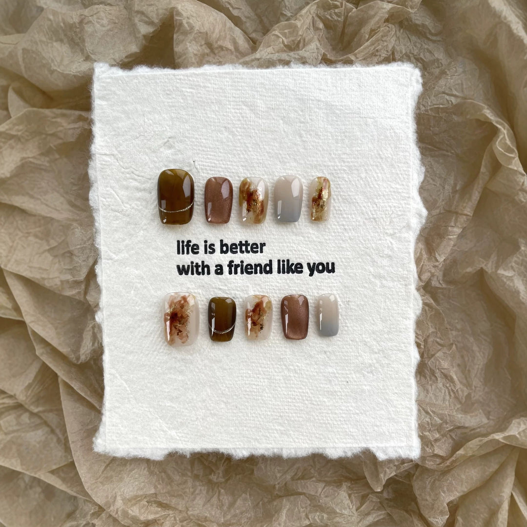 Artistic Press-On Nail Art Set with Elegant Earthy Patterns