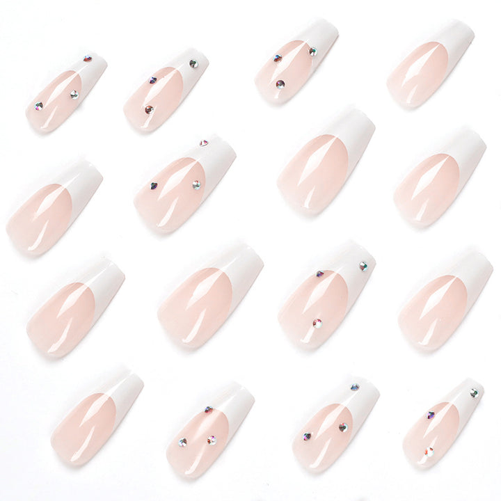 Artistic artificial nails in elegant French tip design with glitter accents Kalsten