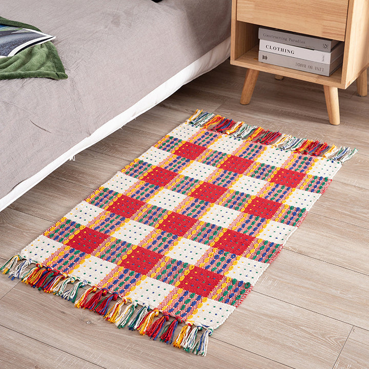 Striped cotton doormat with non-slip bottom and decorative woven edge Kalsten