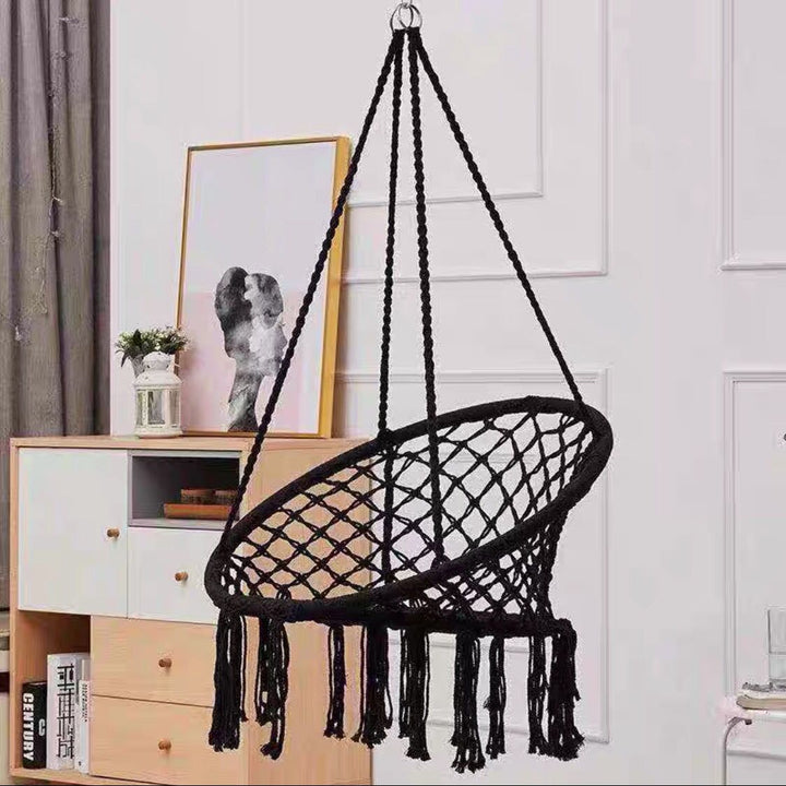 Boho macrame hanging swing chair with faux fur cushion and fringe Kalsten