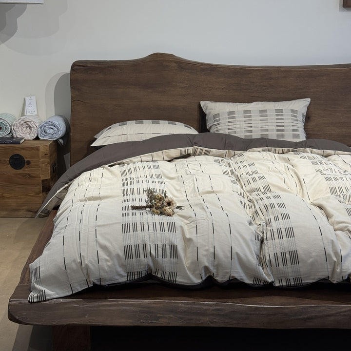 Cotton percale bedding set with a light quilted texture and subtle striped texture