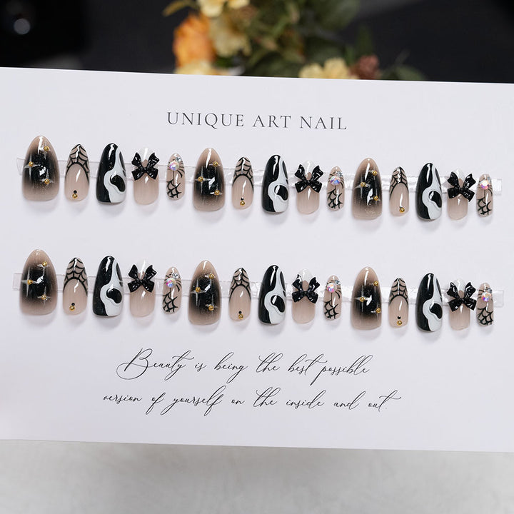 Artistic Press-On Nail Set with Unique Black and White Design